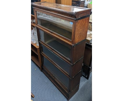 An early 20th century Globe Wernicke oak four tier bookcase, 144h x 86.5wLocation: 