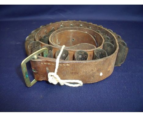 Vintage brown leather 12 bore cartridge belt with metal cartridge clips 