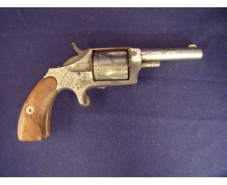 Hopkins & Allen Blue Jacket No 2 .32 rim-fire revolver circa 1879 with two piece wooden grip and engraved detail with name, p