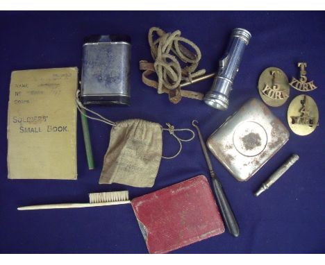 Selection of various military related soldiers personal items including shoulder titles for T5 York, Pocket torch, signalling