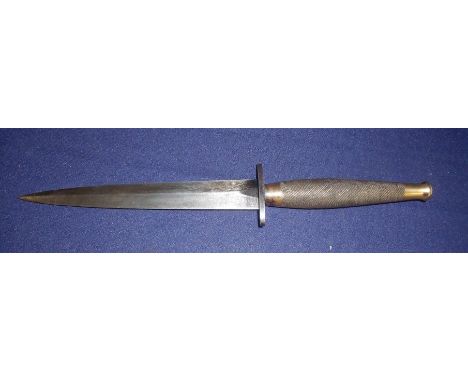 Fairbairn Sykes fighting knife with 7 inch double edged blade engraved the FS fighting knife with steel cross piece stamped w