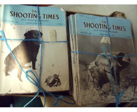 Two boxes containing an extremely large selection of various vintage Shooting Times magazines mostly dating from the 1960/70s