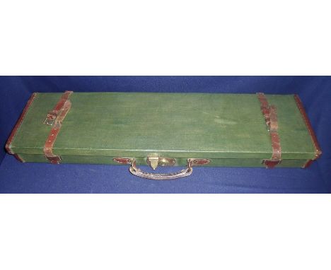 Vintage canvas and leather bound sporting gun case with brass locks and fitted interior 