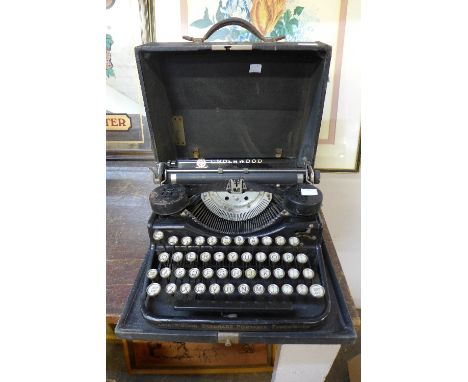 An Underwood typewriter, cased