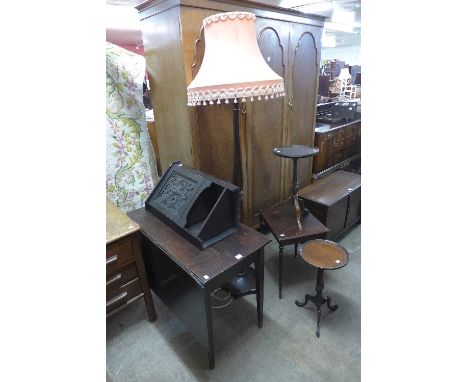 A mahogany drop leaf table, three occasional tables, corner cabinet and standard lamp