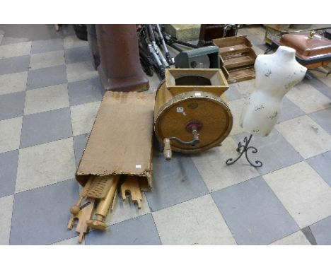 A table top mannequin, butter churn and a weaving machine