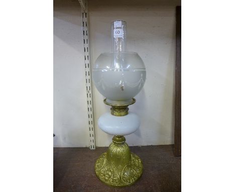 A Victorian gilt oil lamp