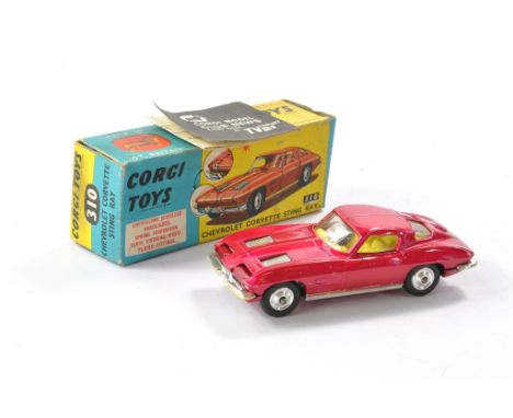 Corgi No. 310 Chevrolet Corvette Stingray. Metallic Cerise with lemon yellow interior. Generally very good, a few marks of we