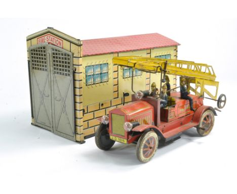 Large (30cm) JDN Distler Fire Station comprising tinplate lithographed building with two opening doors that displays to inclu