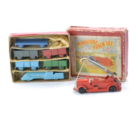 Crescent 'Goods' Miniature train set with original box plus DCMT Fire Engine. Both very good with only minor wear. 