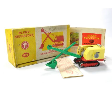 Dinky No. 975 Ruston Bucyrus Excavator. Yellow with red base, green jib and shovel, Rubber tracks. Generally excellent with v