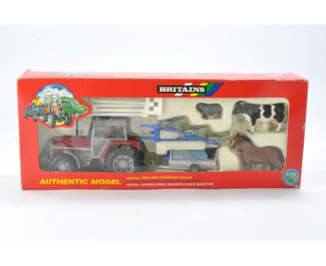 Britains 1/32 Farm Issue comprising No. 9665 Massey Ferguson Tractor, Ploughs, and Trailer Gift Set. Complete set appears exc