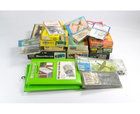 A group of model railway kits and cars from various makers. Complete and unstarted. 