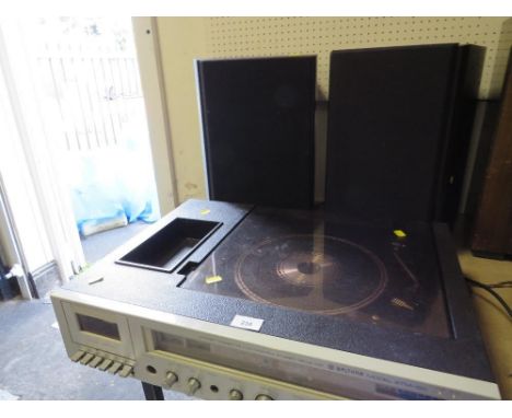 A Waltham STM-50 stereo/radio record player, cassette deck (untested) complete with a pair of Pioneer pro-log 50 speakers 