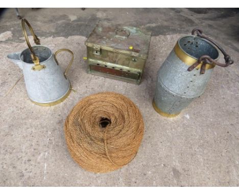 Four vintage items to include a small animal transport box, a ball of string and two zinc and brass water carriers 