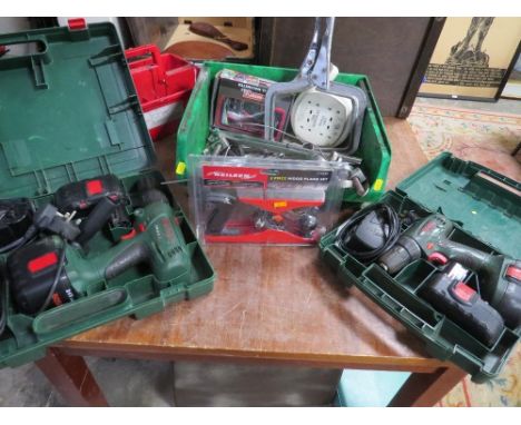 Two boxed Bosch rechargeable cordless drills / screwdriver and a box of tools 
