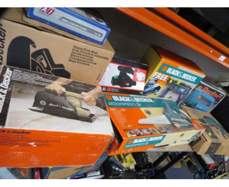 A selection of boxed electric DIY tools 