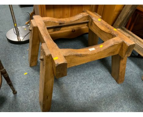 A vintage wooden barrel holder stamped GWR 