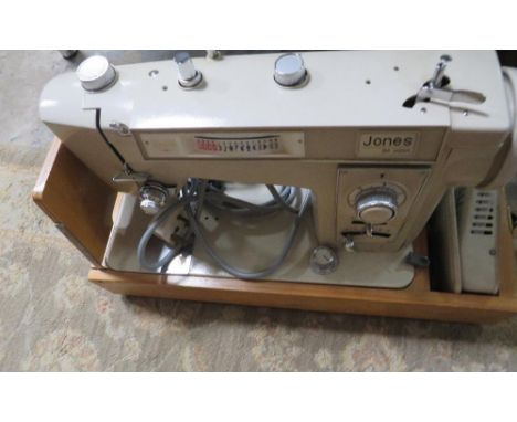 A vintage cased Jones sewing machine 