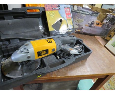 A boxed JCB 200w grinder 