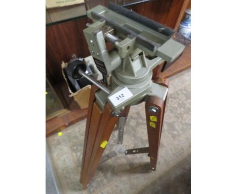 A vintage Vixen astronomical telescope tripod 