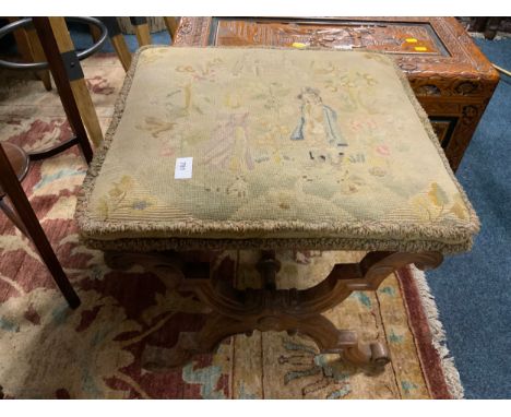 An antique 19th century cross framed tapestry stool 
