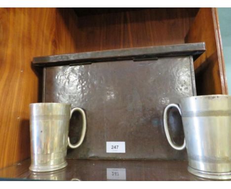 A vintage copper covered box with Art Nouveau design to lid with two metal cups 