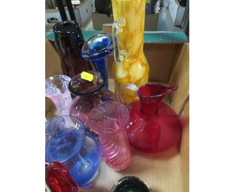 A tray of assorted coloured glass to include Caithness style examples 