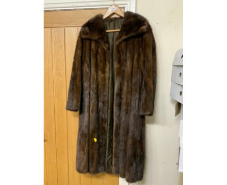 A vintage rich mahogany brown mink fur three-quarter length coat, fully lined with embroidered embellishment to the lining 