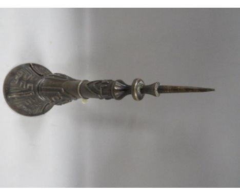 A bronze style Oriental table spike with character mark to base 