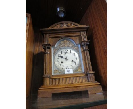 A vintage wooden mantle clock 