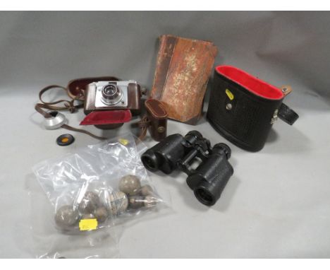 A tray of collectables to include camera and binoculars 