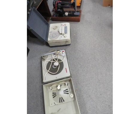 A vintage cased Singer sewing machine together with a portable record player and a reel to reel A/F 