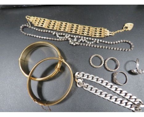 Two vintage gold plated bangles together with silver flat linked bracelet approx. weight 38g and four silver rings etc 