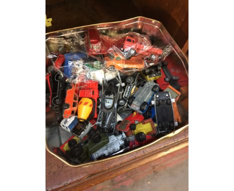 TIN OF MODEL VEHICLES