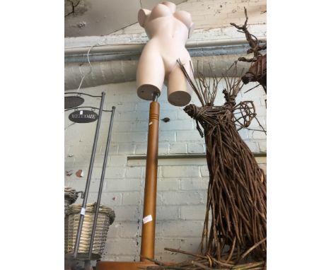 A FEMALE MANNEQUIN TORSO