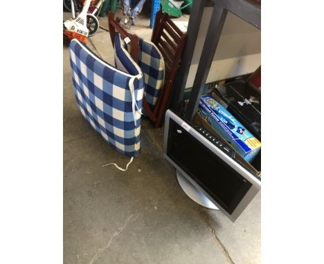 A 15" BUSH LCD TV WITH DVD PLAYER AND A FOLDING STOOL