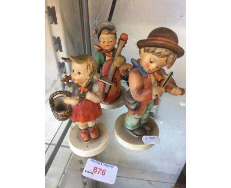 THREE HUMMEL FIGURES CCONDITION:  BASKET HANDLE BROKEN IN 4 PLACES, GIRL WITH BASKET MARKED HUMMELL.  HEIGHTS: 12.5, 13.5, 15