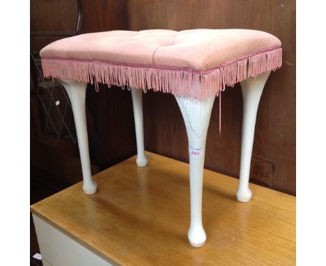A WHITE LEGGED AND PINK UPHOLSTERED STOOL
