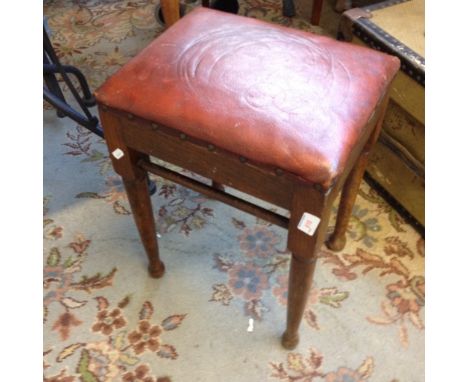 A SMALL OAK STOOL