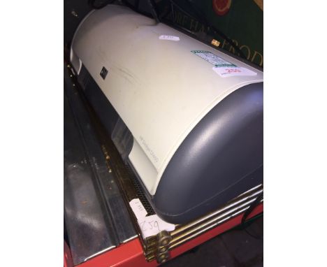 A HP PRINTER AND A FIRE SCREEN