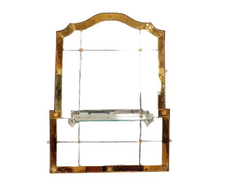 FRENCH ART DECO WALL MIRROR, circa 1935, the sectioned central plate within an amber tinted border, mounted with floral motif