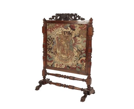 REGENCY MAHOGANY AND EMBROIDERED RISE AND FALL FIRESCREEN, circa 1815 and later elements, the winged cherub head cresting fla