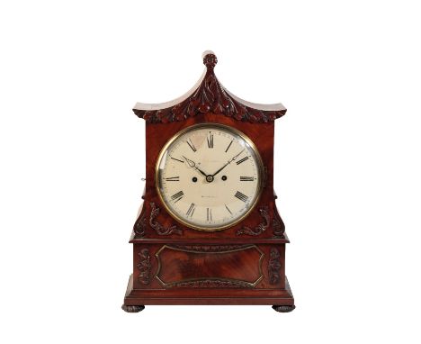 GEORGE III MAHOGANY BRACKET CLOCK, the 20cm round dial, with Roman numerals, inscribed "Thomas Saunders Dorchester", the twin
