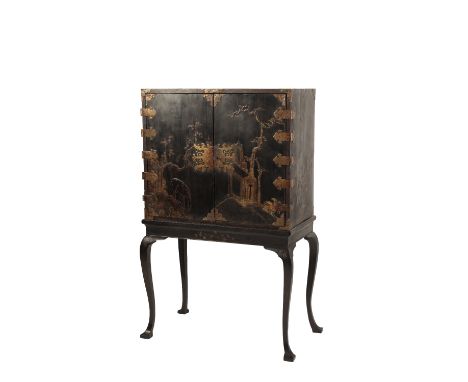 WILLIAM AND MARY OR GEORGE I BLACK LACQUERED AND PARCEL GILT CABINET ON STAND IN CHINOISERIE STYLE, early 17th century, the t