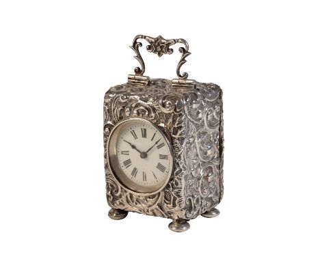 VICTORIAN SILVER CARRIAGE CLOCK, the white enamel dial with Roman numerals, French manual wind movement, the embossed case wi