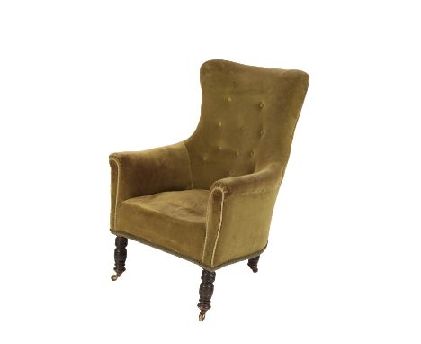 BUTTON BACK GREEN VELVET UNPHOLSTERED ARM CHAIR, second quater 19th century, with waisted back and four turned legs on castor