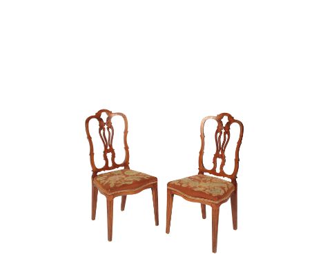 SET OF SIX DUTCH ELM DINING CHAIRS, circa 1800, the shaped backs with pierced splats over serpentine seats covered in floral 