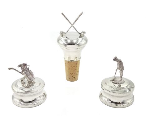 Silver golf club bottle stopper and two silver paper weights in the form of a golf bag and golfer, all by L R Watson, Birming