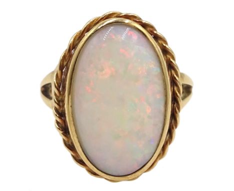 9ct gold single stone opal ring, Edinburgh 1976 - Condition Report Approx 3.9gm, size K, opal = 17mm x 10mm 